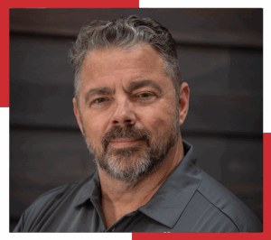 man with salt and pepper beard and hair