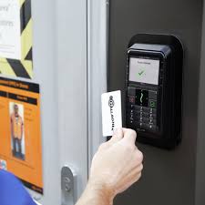 person opens door with gallagher card access