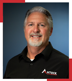 man smiling in black shirt
